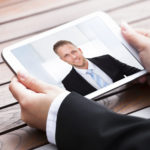 Businesswoman Video Conferencing With Colleague