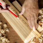 carpenter-working-using-ruler-pencil