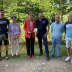 1. Une belle photo de famille autour de Sophie Deknuydt et P-Y Monneret