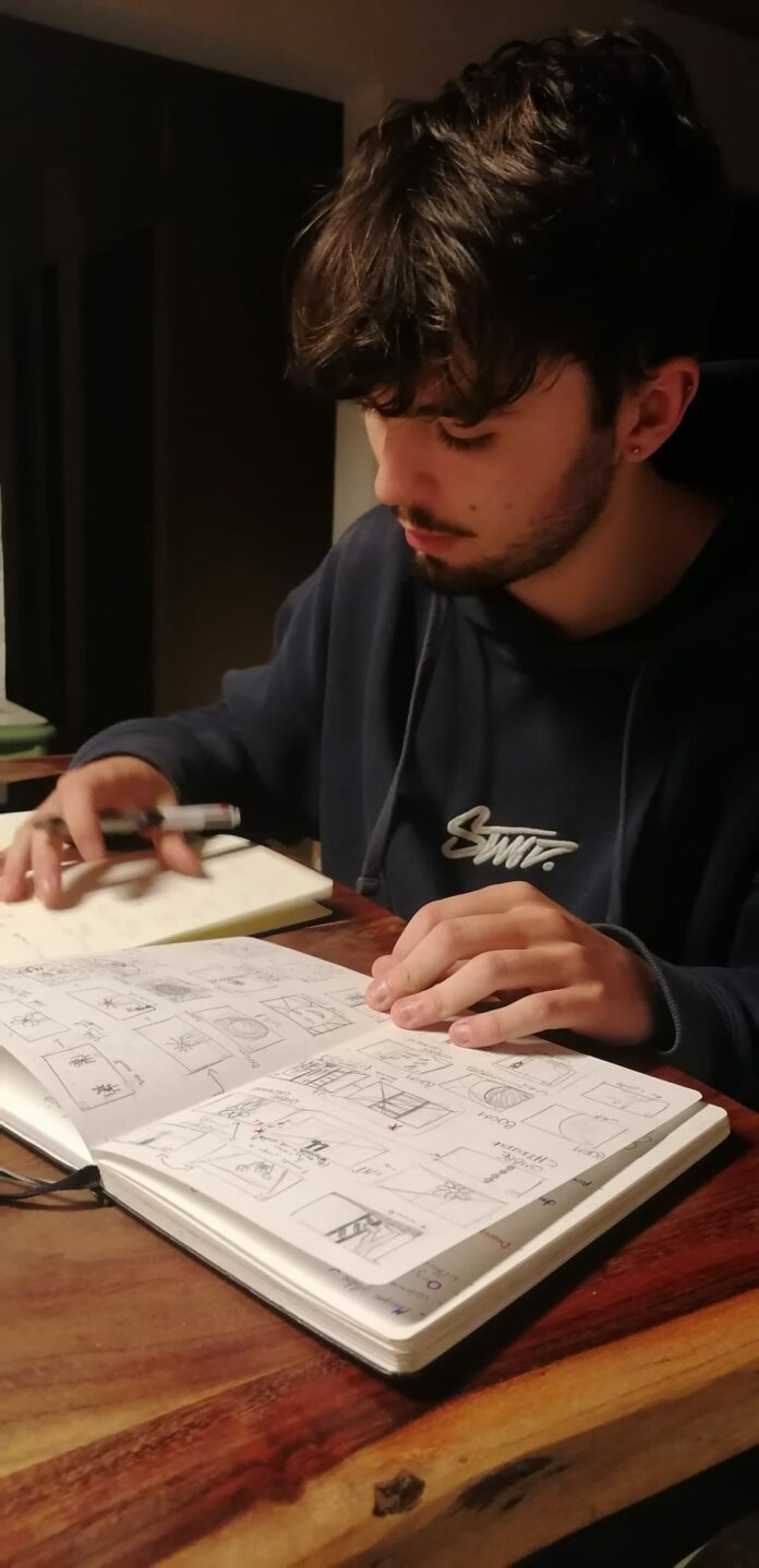 Portrait de Zéphyr Buffard qui est en train d'écrire