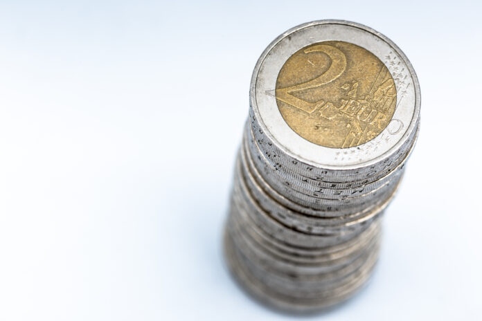 Stack of two euros isolated with selective focus